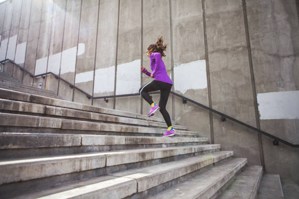 istock young sporty woman running 693984022