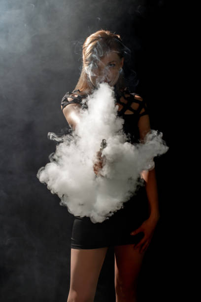 istock Beautiful girl vaping/vape 693985124