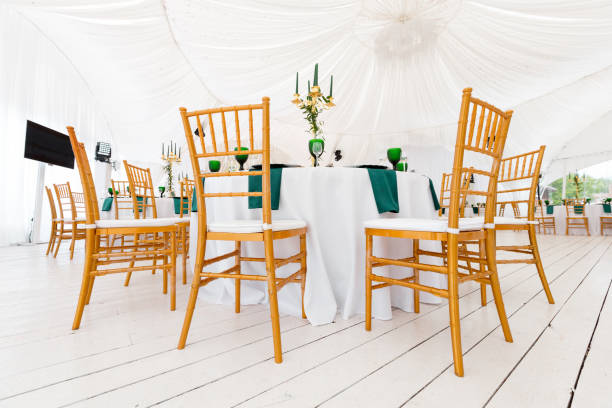 istock Beautifully organized event - served festive round tables ready for guests 693987714