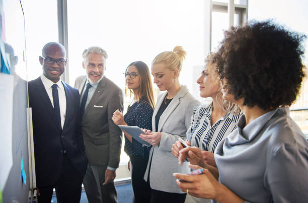 istock Diverse business team brainstorming in office 693992478