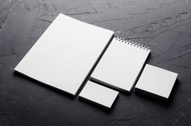 istock Blank stationery on elegant dark grey concrete texture. Corporate identity template. Mock up for branding, graphic designers presentations and portfolios. Top view. 693996530