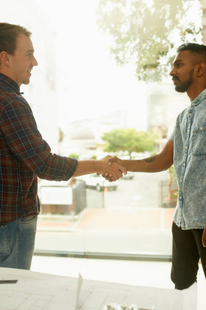 istock Together, we'll take business to greater heights 693997804