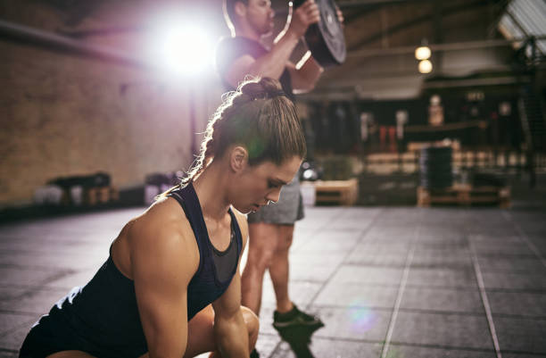 istock Sportive young people having hard working out 694005048