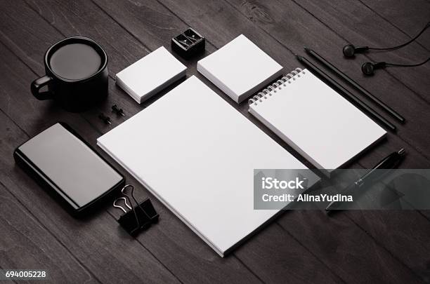 Corporate Identity Template Blank Stationery Set With Coffee And Earphone On Black Stylish Wood Background Mock Up For Branding Business Presentations And Portfolios Stock Photo - Download Image Now