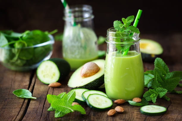 Avocado and cucumber detox smoothie stock photo