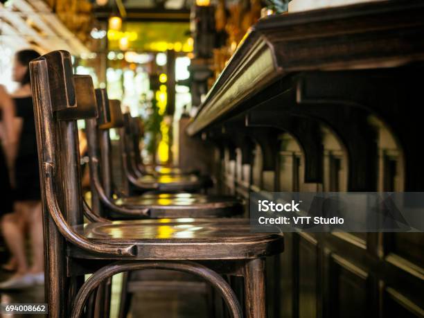 Bar Counter Seat Row Cafe Restaurant Interior Vintage Style Stock Photo - Download Image Now