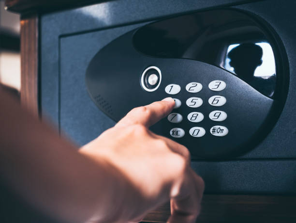 istock People hand on Safe lock Pad number secret Password 694008694