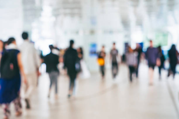 istock Blur People walking Modern Building space urban lifestyle 694008700