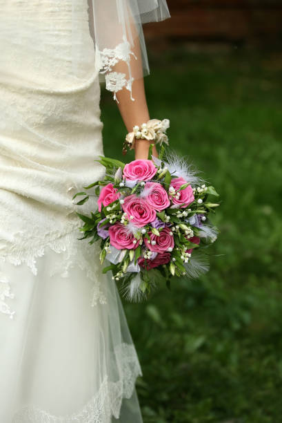 istock Wedding bouquet in hands of the bride 694012920