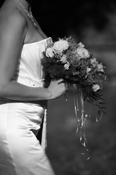 istock Wedding bouquet in hands of the bride 694012952