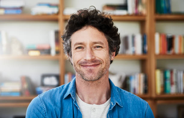 istock Proud of his literary collection 694016610