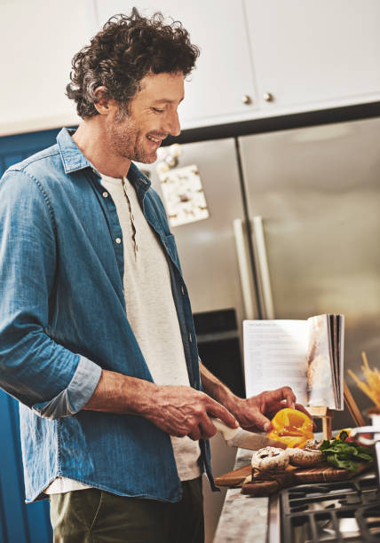 istock Ladies love a man in the kitchen 694016618