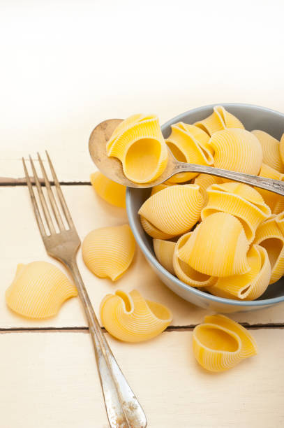 istock Italian snail lumaconi pasta 694019326