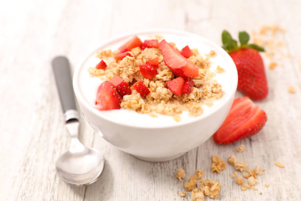 istock muesli with berry and milk 694019438
