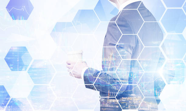 istock Businessman with coffee and city, graphs 694022932