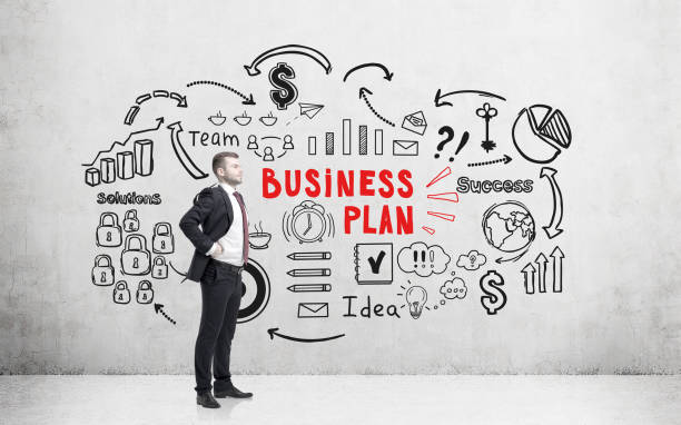 istock Confident bearded man and business plan 694028220