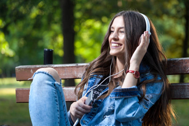 istock She just enjoy and relax while listening to music 694029562