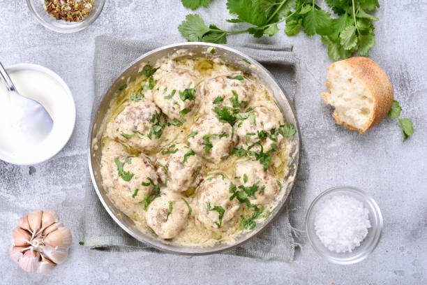 istock Meatballs with white sauce 694033038