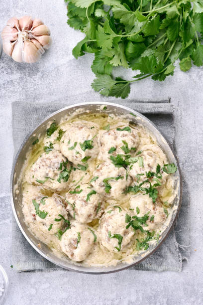 istock Meatballs with white sauce 694033044