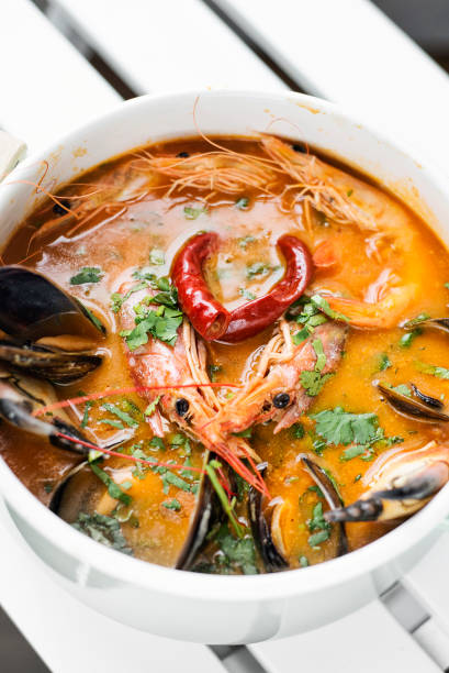 istock mixed fresh creamy spicy seafood soup bowl 694036692