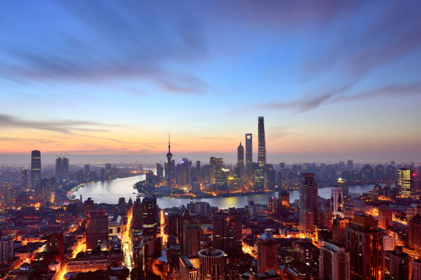 istock Shanghai Skyline in Dramatic Sky at Dawn 694040898