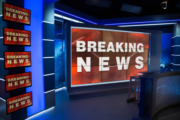 Television studio Breaking news text on device screen in press room. press room photos stock pictures, royalty-free photos & images