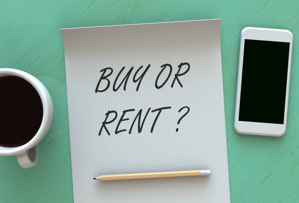 istock Buy Or Rent, message on paper, smart phone and coffee on table, 3D rendering 694041608
