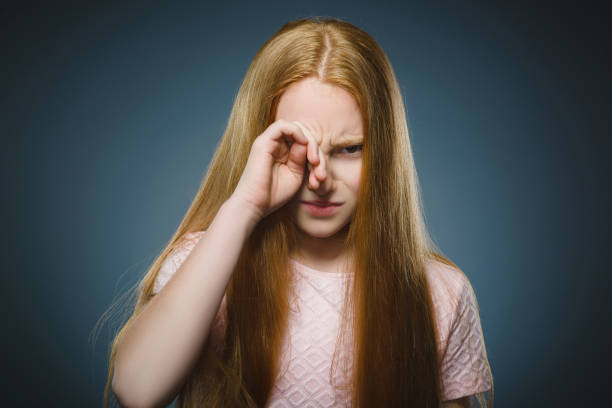 Closeup sad girl with worried stressed face expression stock photo
