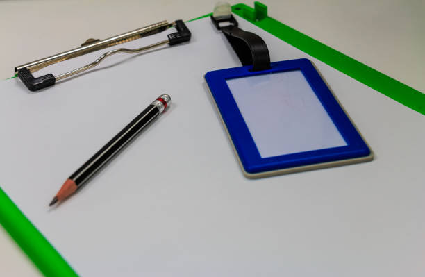 istock clipboard, pencil and ID card 694047656