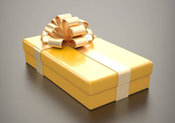 istock Yellow gift with gold ribbon 694050744
