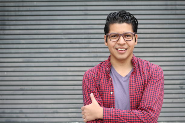 istock Hispanic man wearing glasses portrait 694054818