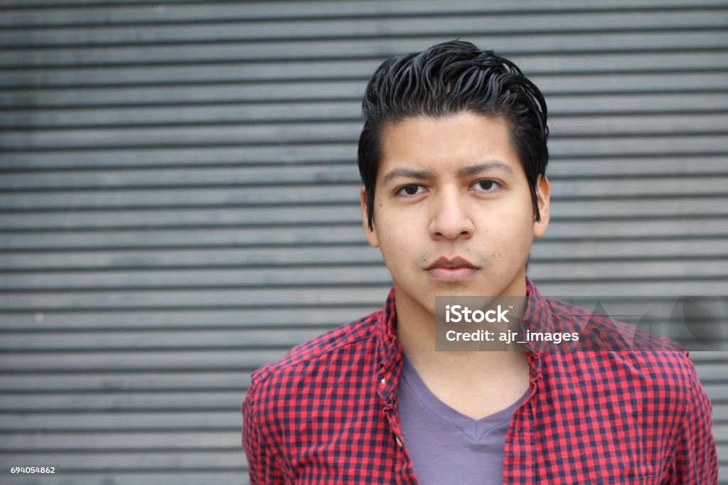 Good looking Hispanic male isolated with copyspace Good looking Hispanic male isolated with copy space. Men Stock Photo