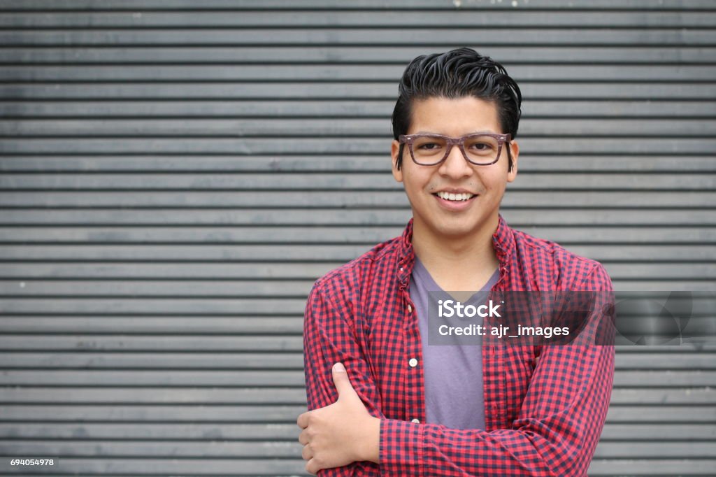 Handsome Hispanic Young Male with Copy Space Beauty Portrait of Handsome Hispanic Young Male, Outdoors, Copy Space - Stock image. Latin American and Hispanic Ethnicity Stock Photo