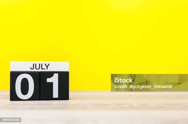 July 1st Image Of July 1 Calendar On Yellow Background Summer Time With Empty Space For Text Stock Photo - Download Image Now