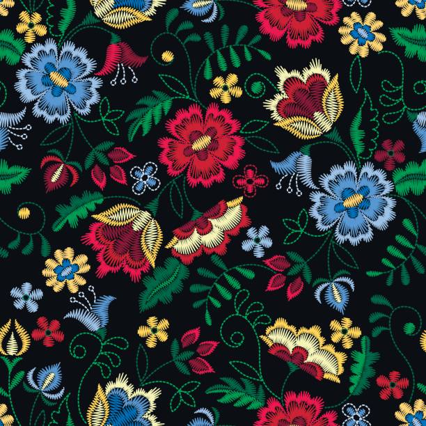 haft bezszwowy wzór z pięknymi kwiatami. wektorowa kwiatowa ozdoba na czarnym tle. hafty dla tekstyliów i tkanin mody. - paisley textile floral pattern pattern stock illustrations