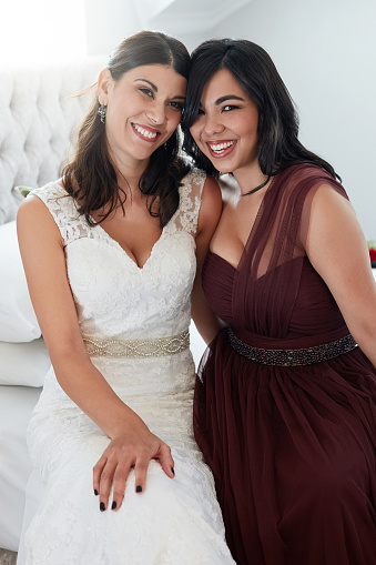 Shot of the bride and maid on honor spending time together