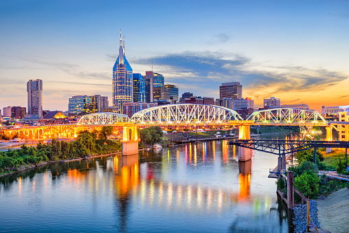 Nashville, Tennessee, USA downtown skyline on the Cumberland River.