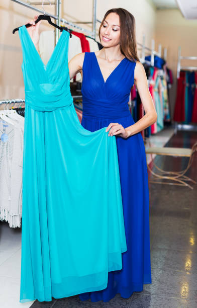 istock Woman choosing new dress 694064820