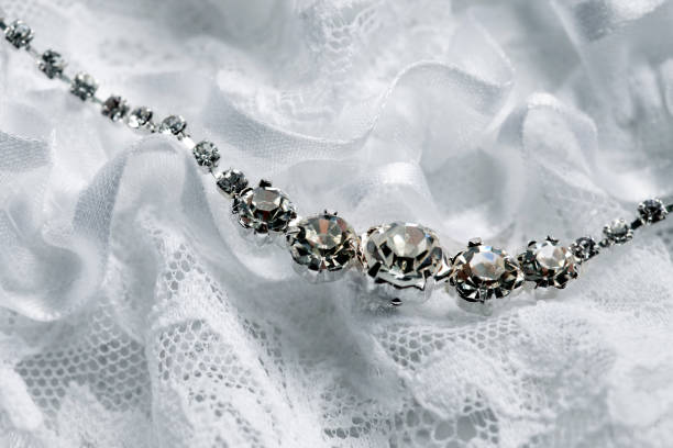istock Wedding necklace on a background of a wedding garter 694068558