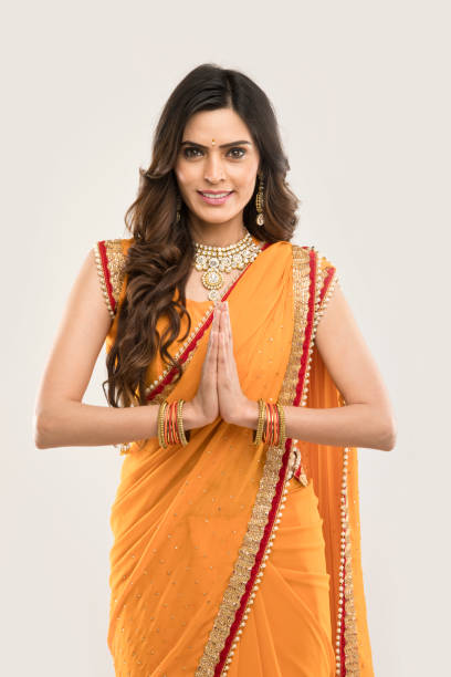 istock Indian woman greeting 694068614