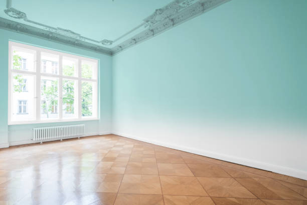 istock empty room, wooden floor in new apartment 694069326