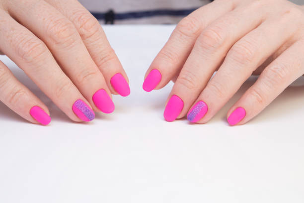 istock Hands with beautiful manicure. Natural nails with gel polish 694073222