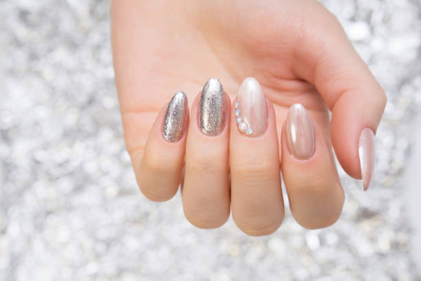 istock Hands with beautiful manicure. Natural nails with gel polish 694075812