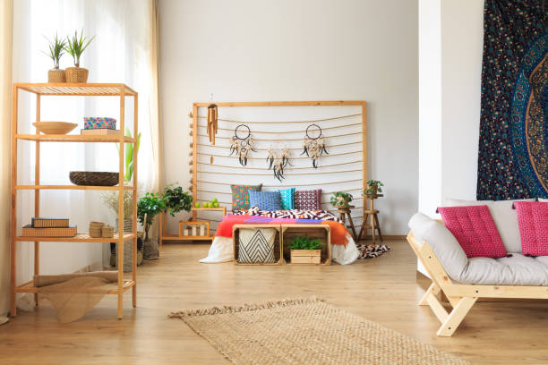istock Colorful bed in bright room 694091264