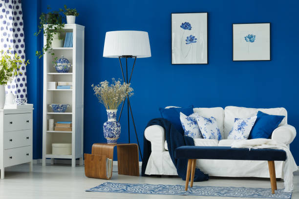 istock Living room with blue walls 694095010