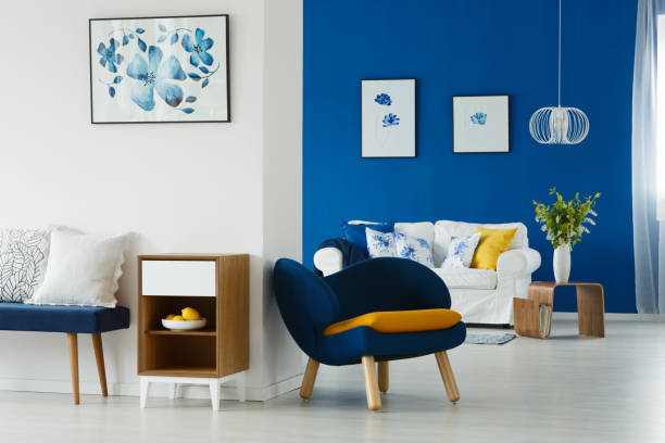 istock Living room with flower posters 694095038