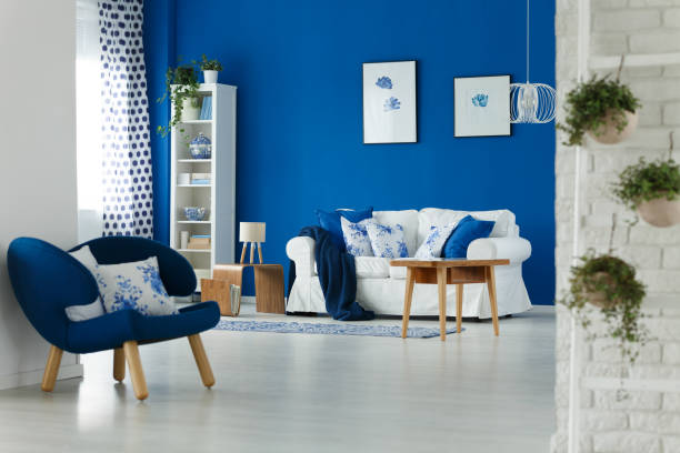 Living room interior design Trendy blue and white living room interior design blue living room stock pictures, royalty-free photos & images