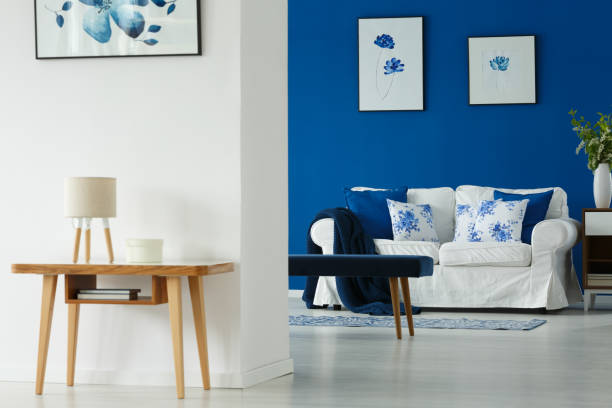 istock Table and sofa in living room 694095106