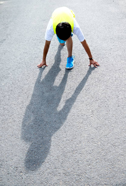 istock Young sports man preparing to run 694095232