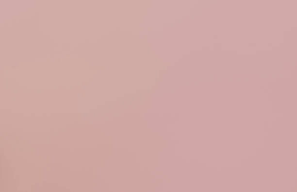 istock A completely smooth background of a pink color 694095966